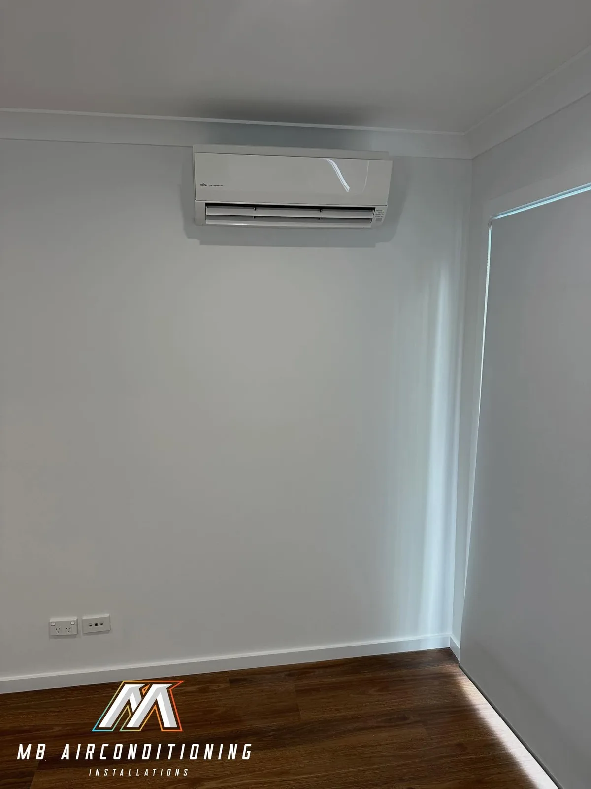 Crisp white split system head unit installed in a Western Sydney home