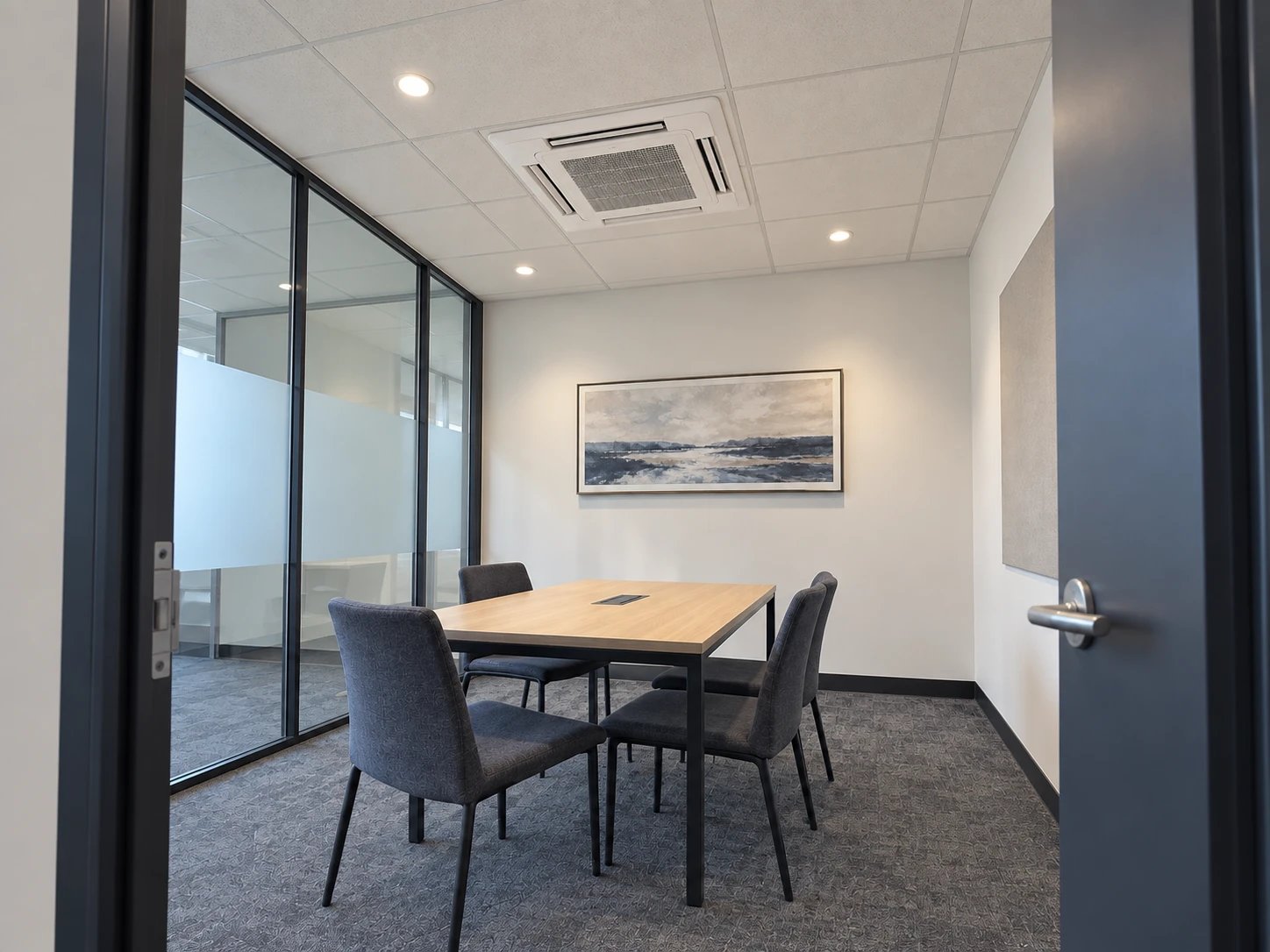 Four-way ceiling cassette in a meeting room