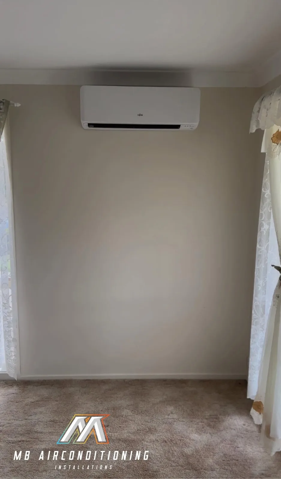Wall-mounted air conditioner in a residential room